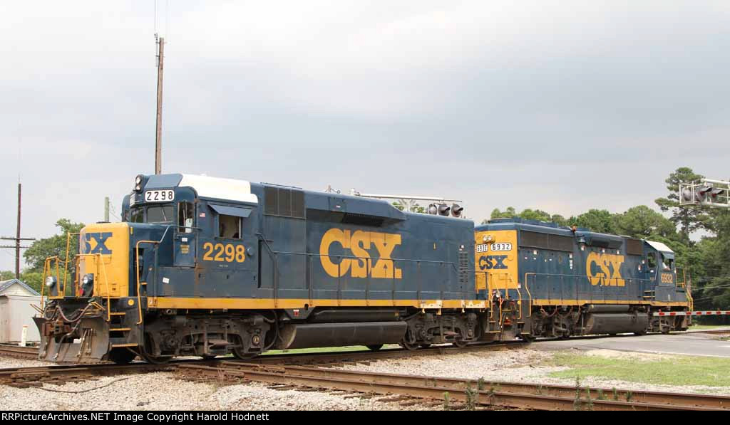 CSX 2298 & 6932 back down towards their train